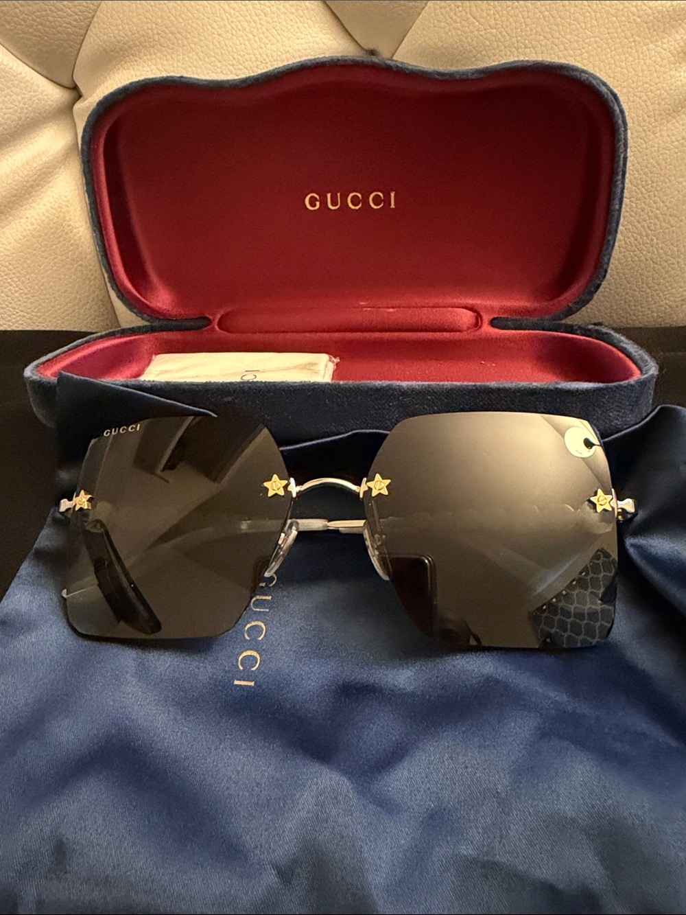 Gucci Men’s Black Sunglasses with Gold Star Accents
